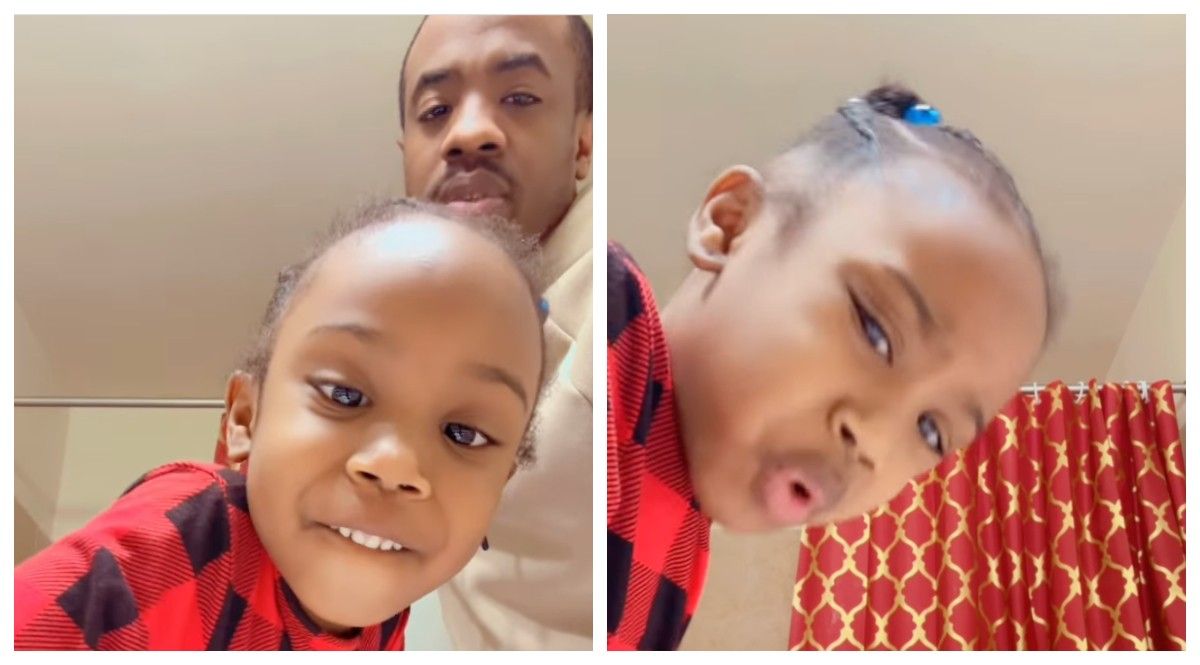 Little girl in red flannel pajamas looks into iPhone camera