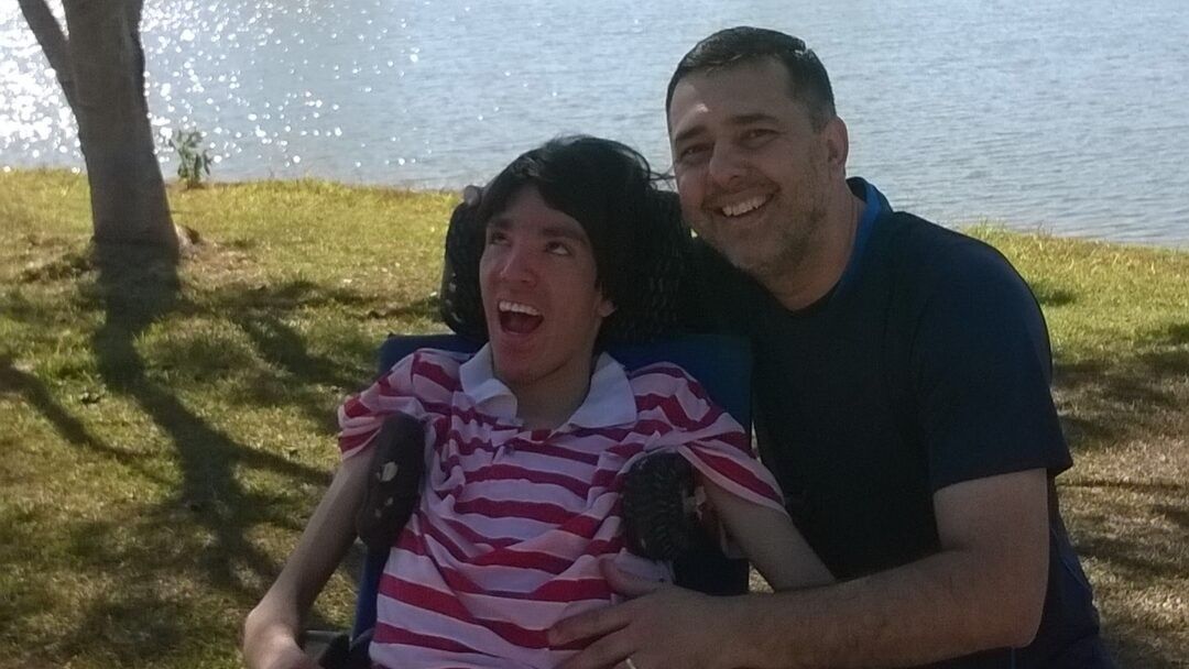 man with a smiling boy