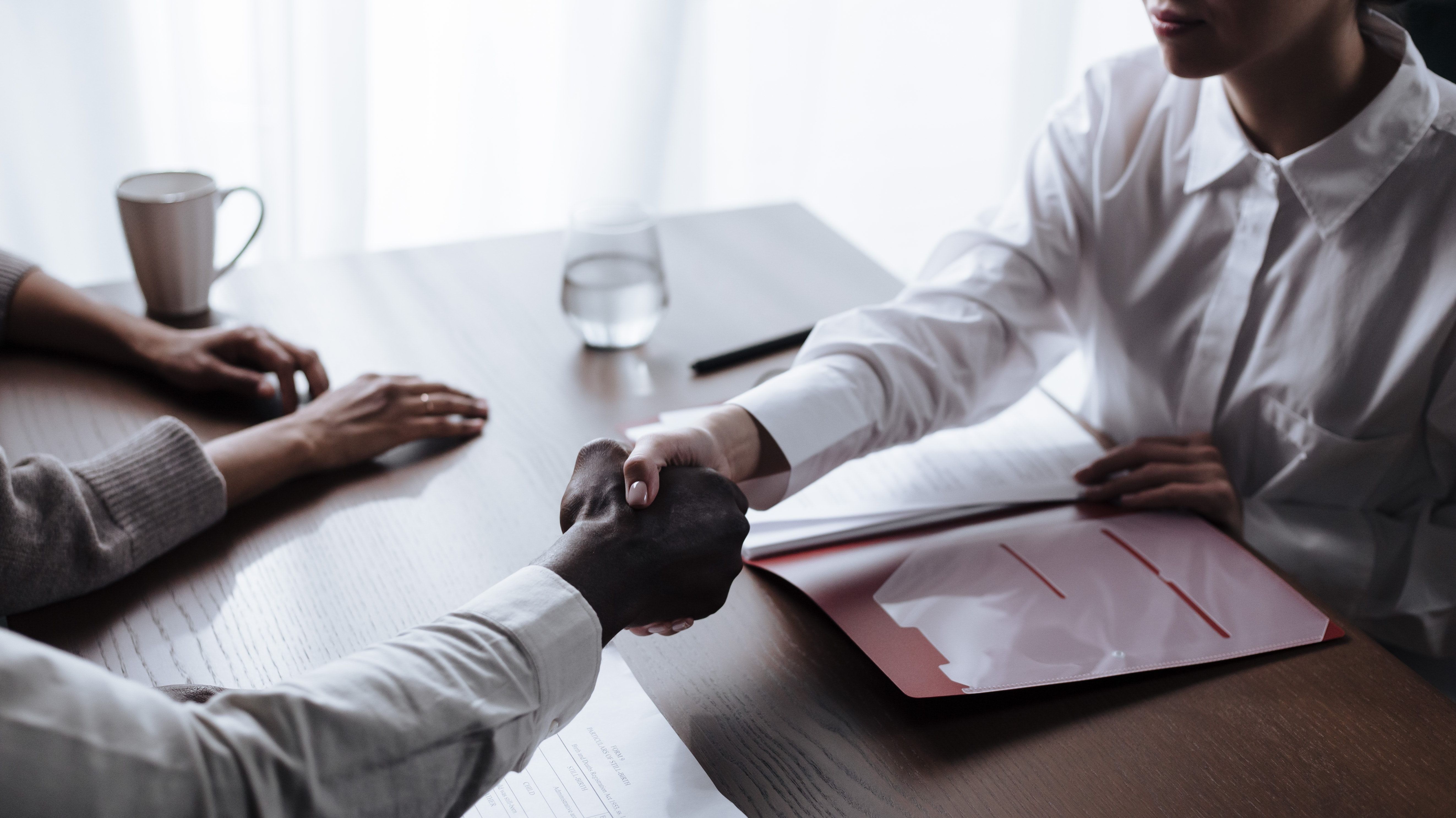 two people shaking hands