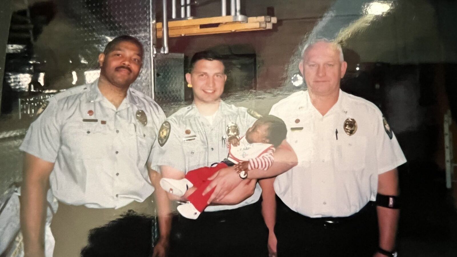 three men and a baby