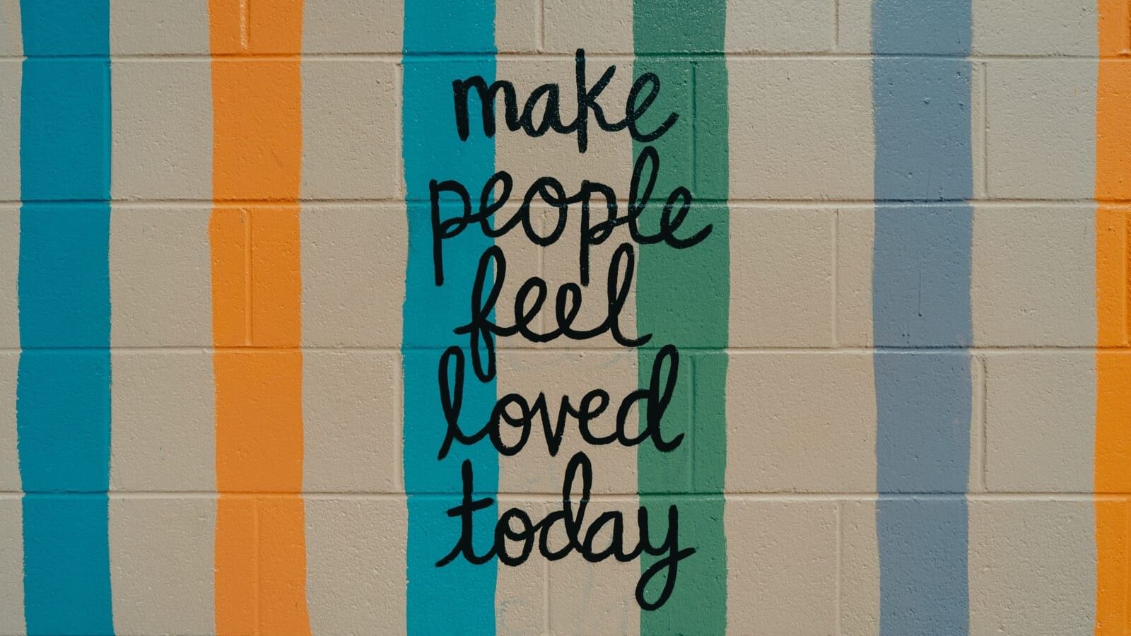 multicoloured wall with quote on it