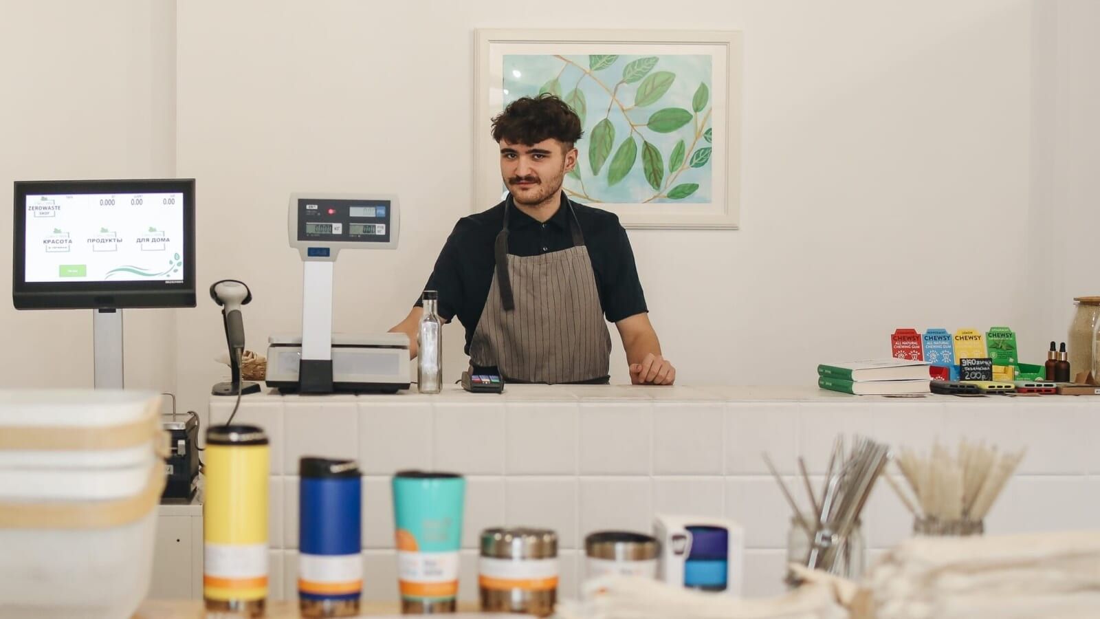 man behind a counter