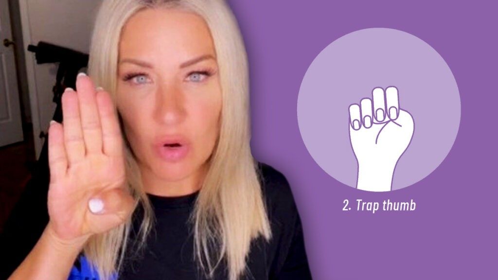 TikTok woman shows SOS sign