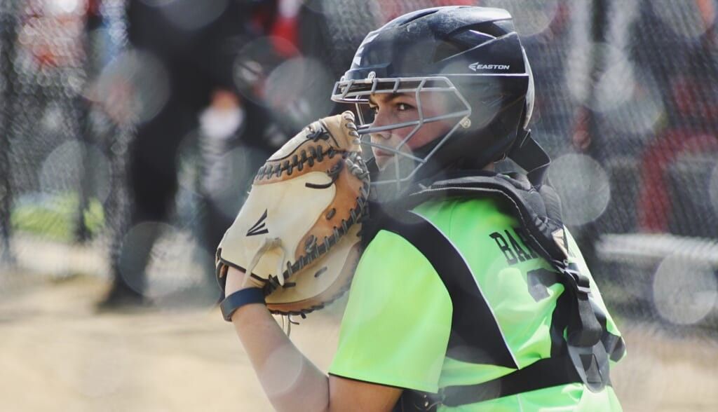 young person plays baseball with passion