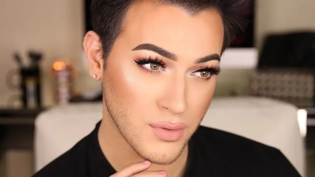 man wearing makeup posing