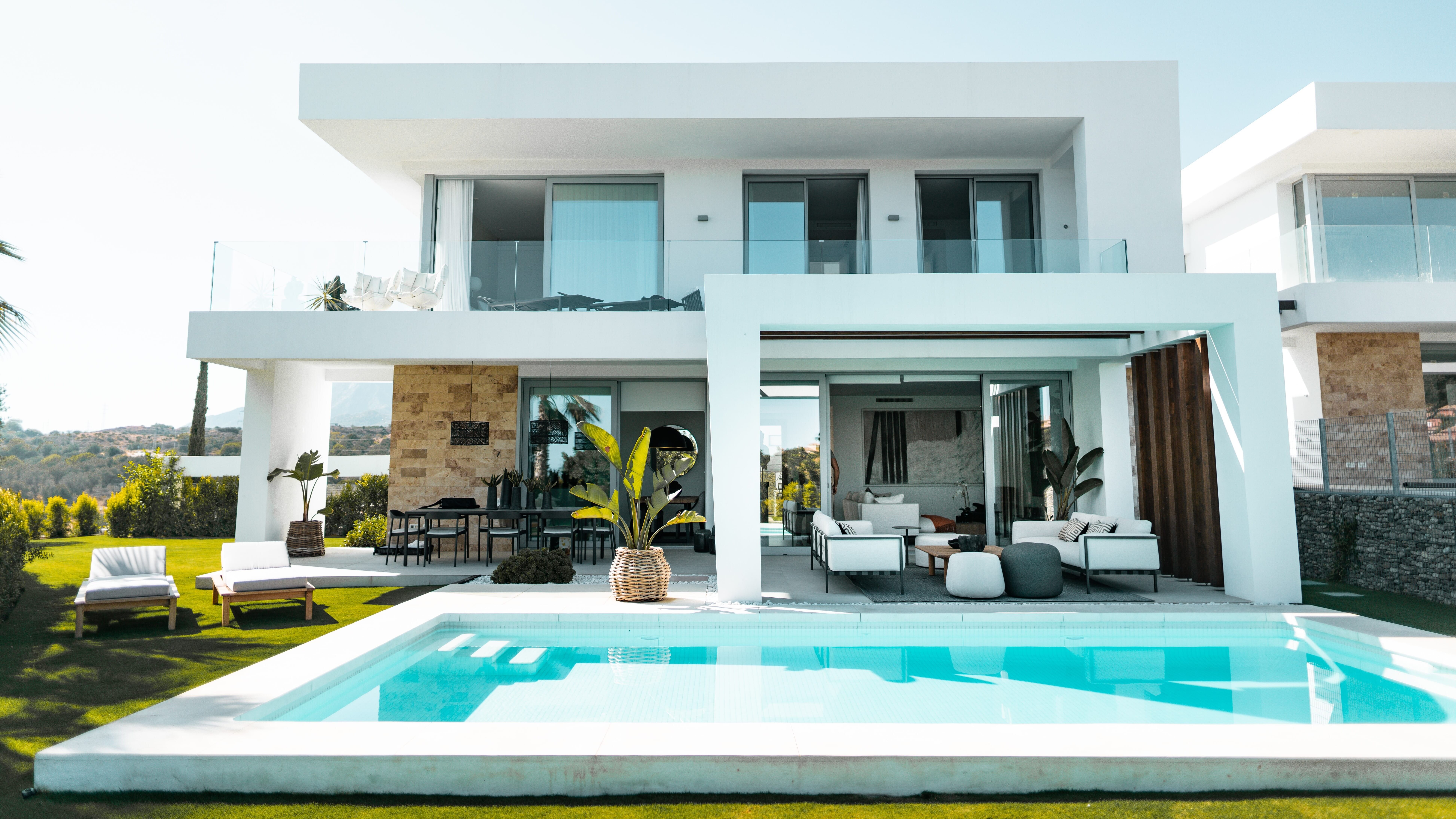 white house with a swimming pool