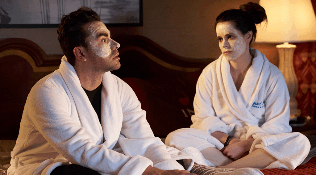 Daniel Levy as David Rose and Emily Hampshire as Steve Budd on Schitt