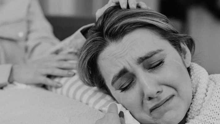 black and white picture of a woman crying