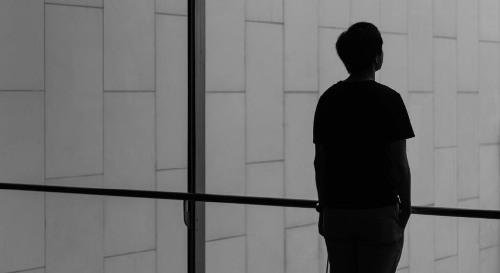 young person by the window