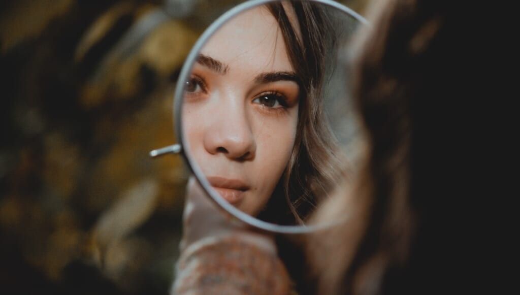 young woman mirror