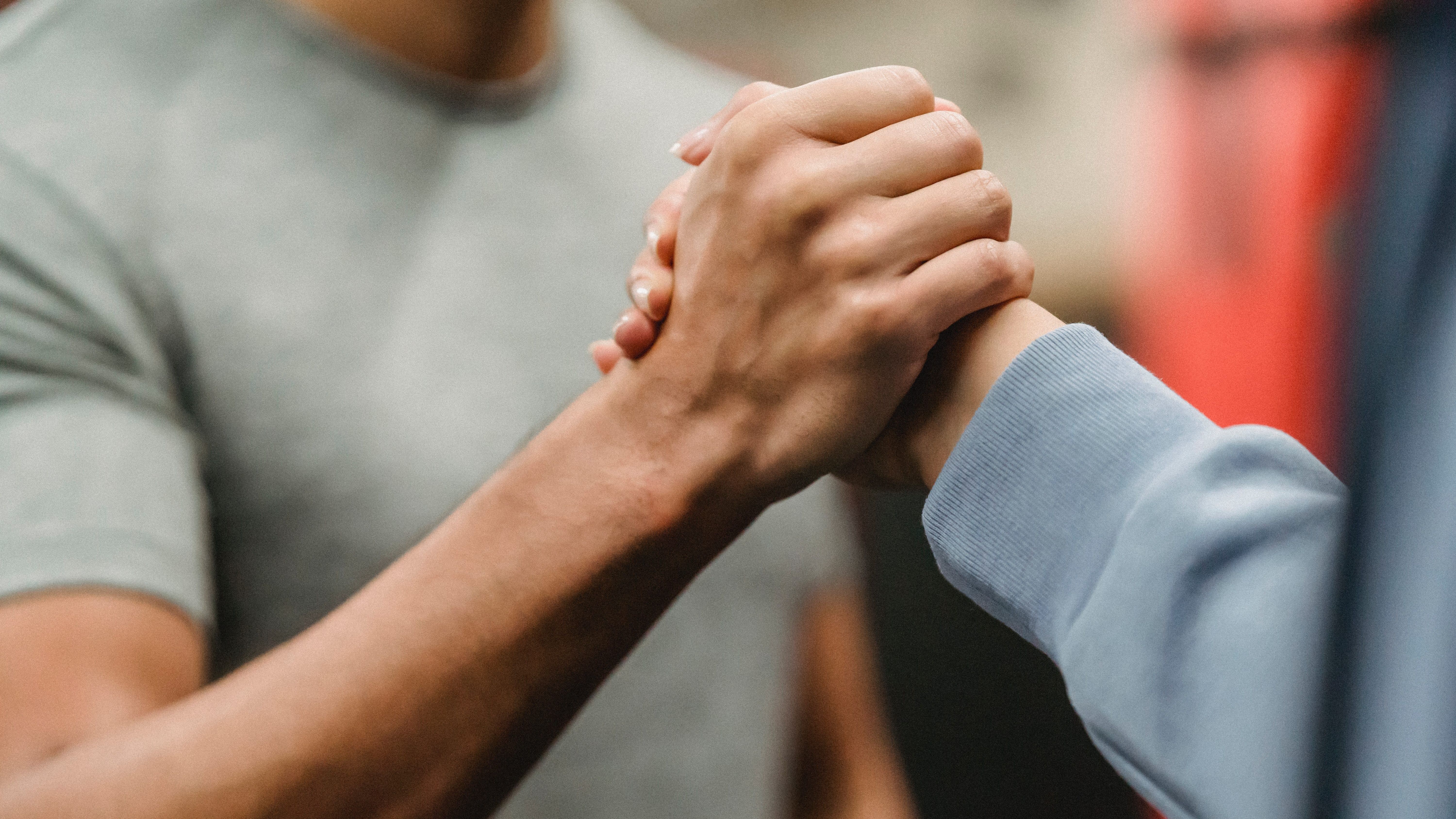two people greeting each other