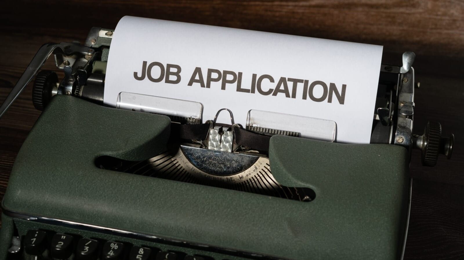 a job application in a typewriter