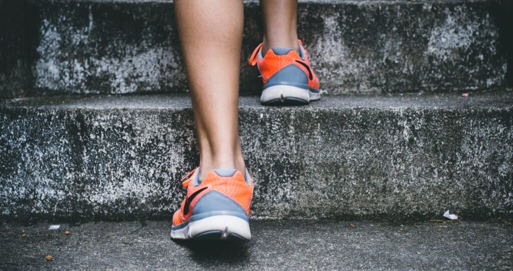feet on concrete steps