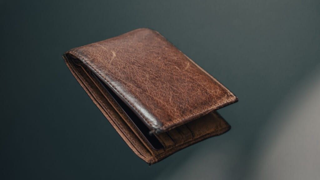 Falling brown wallet