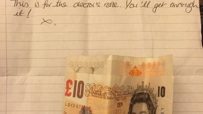 a note and a 10 pound bill