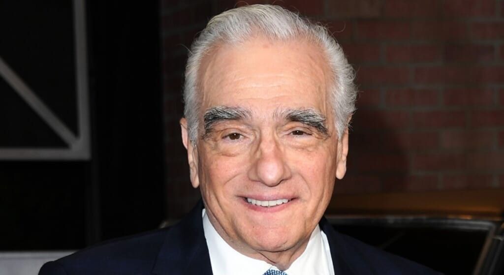 Martin Scorsese smiling at the camera