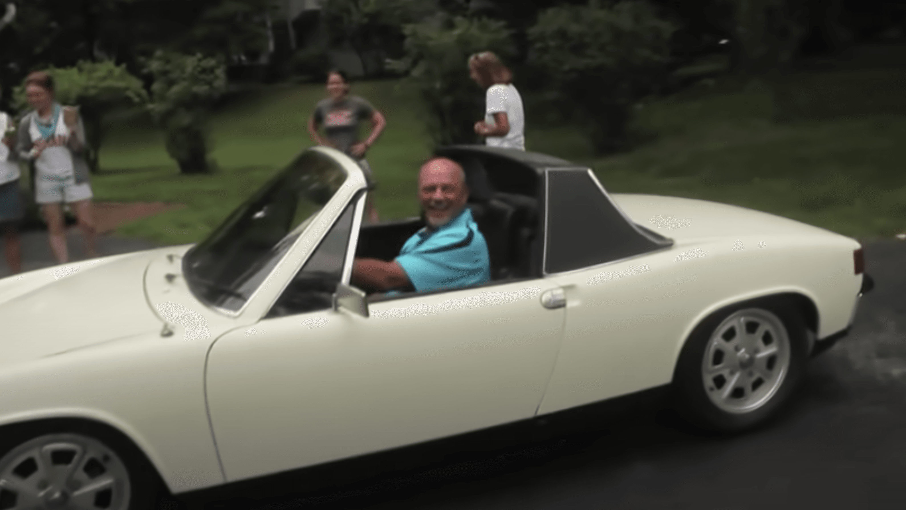 man sitting in a white car