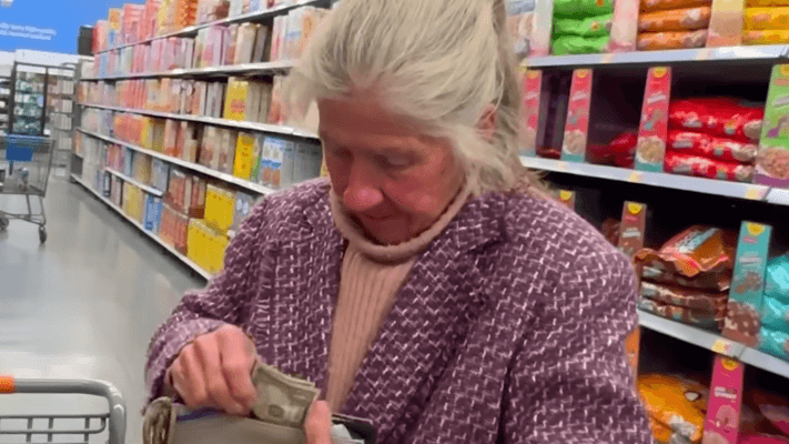 woman helps stranger in a store