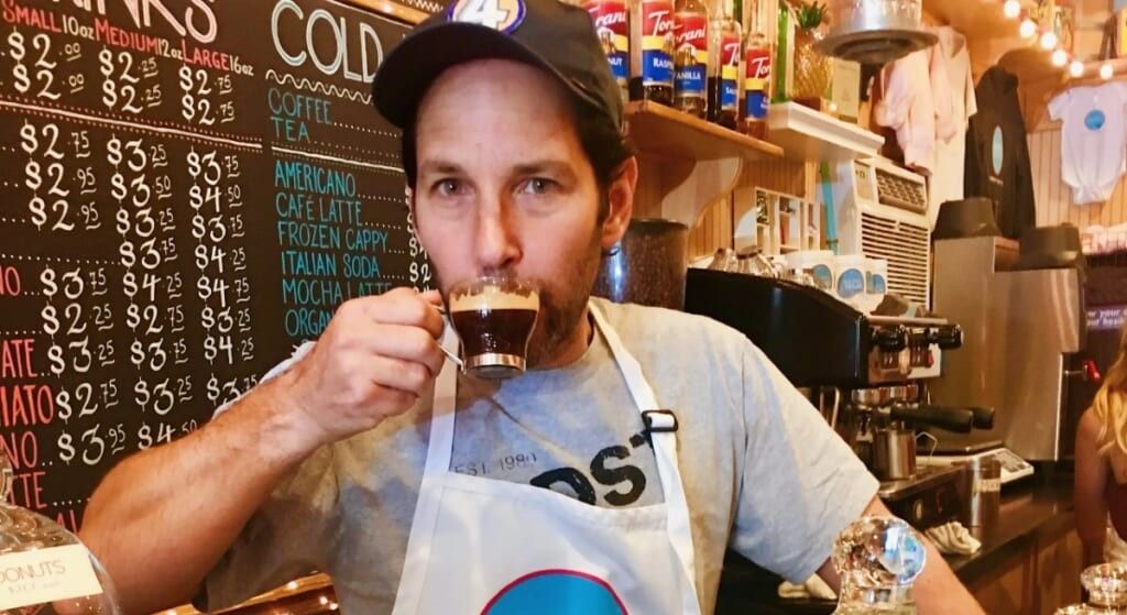 Paul Rudd drinking a cappuccino at his and wife Julie Yaegar