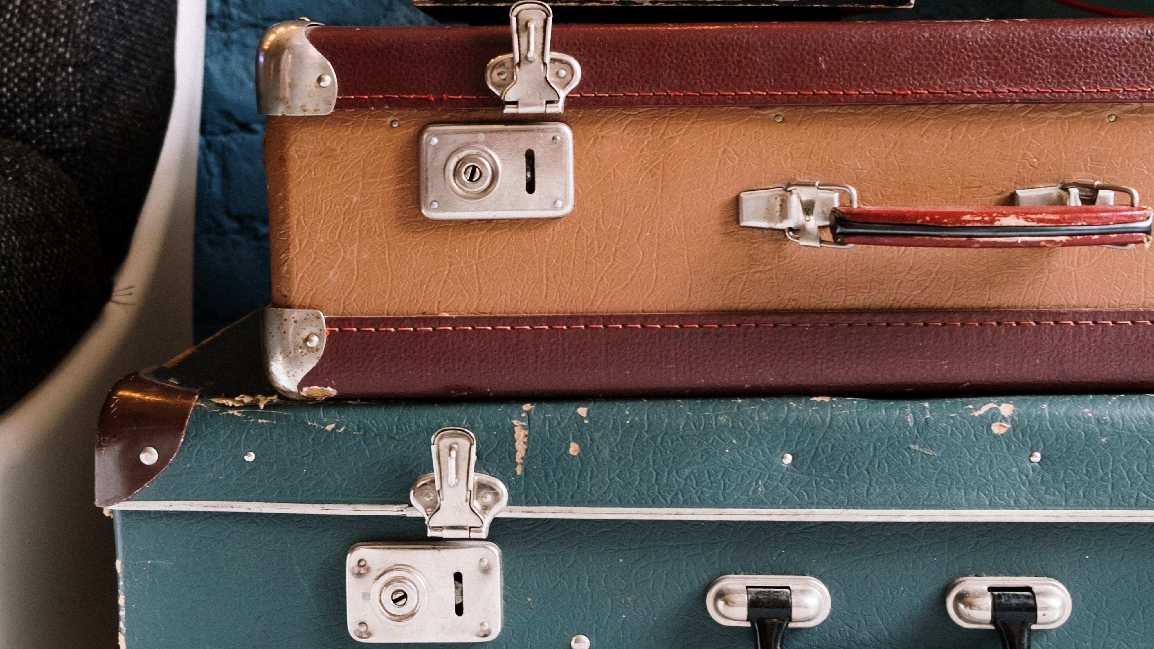 suitcases stacked on top of each other