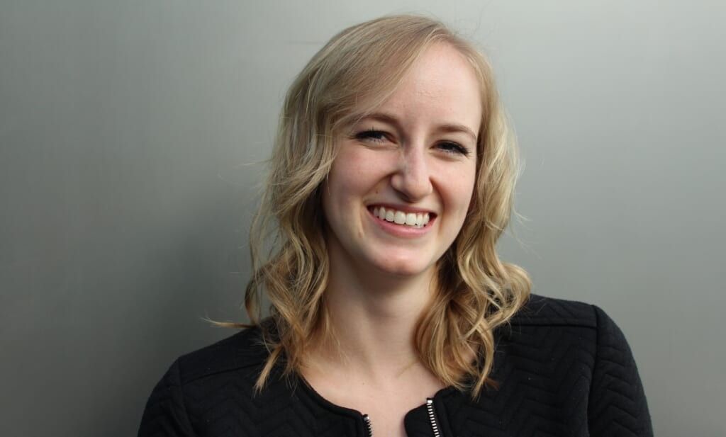 woman smiles into camera