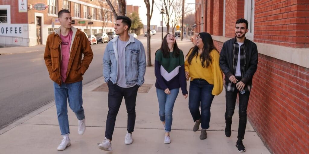 Friends walking together by Eliott Reyna on Unsplash