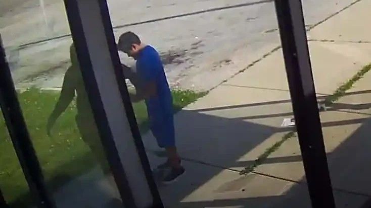 a boy and a woman skateboarding