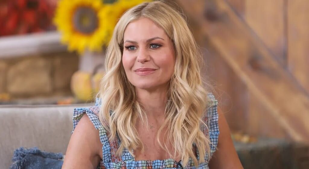 Candace Cameron Bure in blue checkered dress during an interview