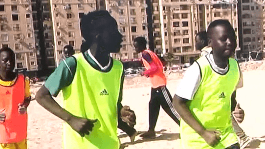 two boys wearing lime green shirts