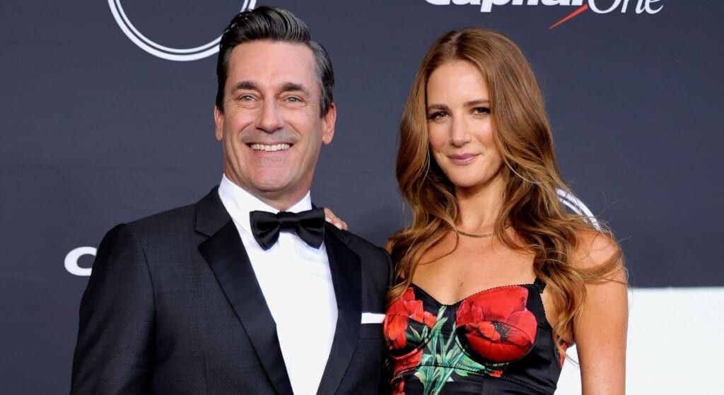 Jon Hamm and girlfriend Anna Osceol posing on the red carpet.a