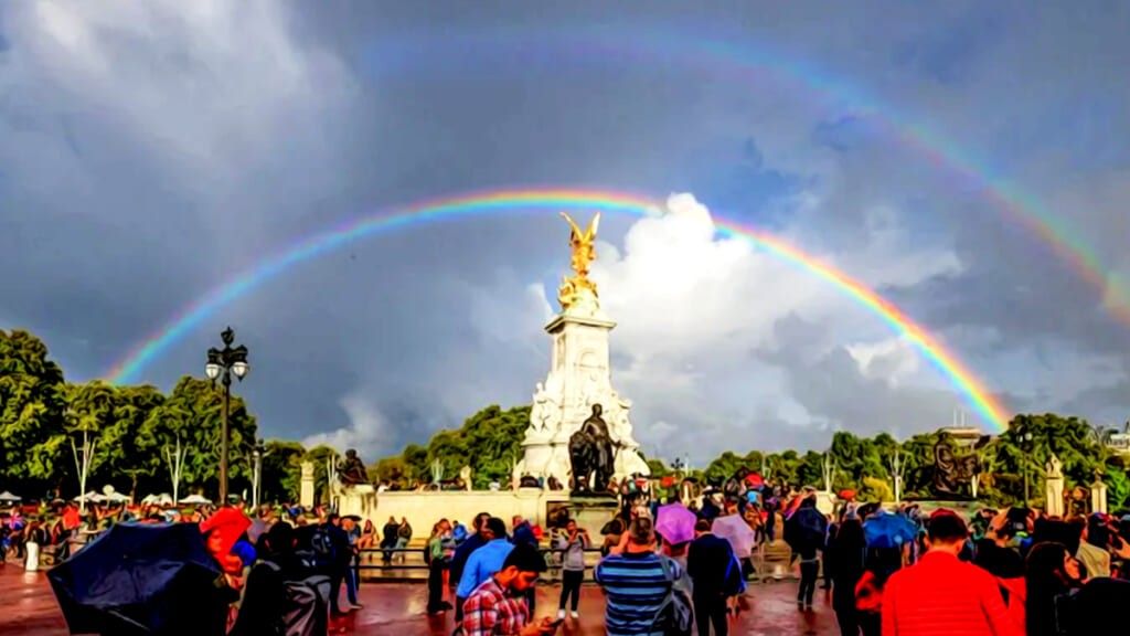 Buckingham Palace double rainbow after the queen