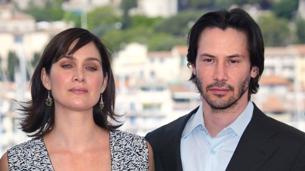 Carrie anne moss and keanu reeves 1024x577