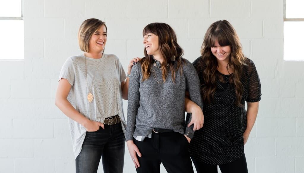 three female friends bonding