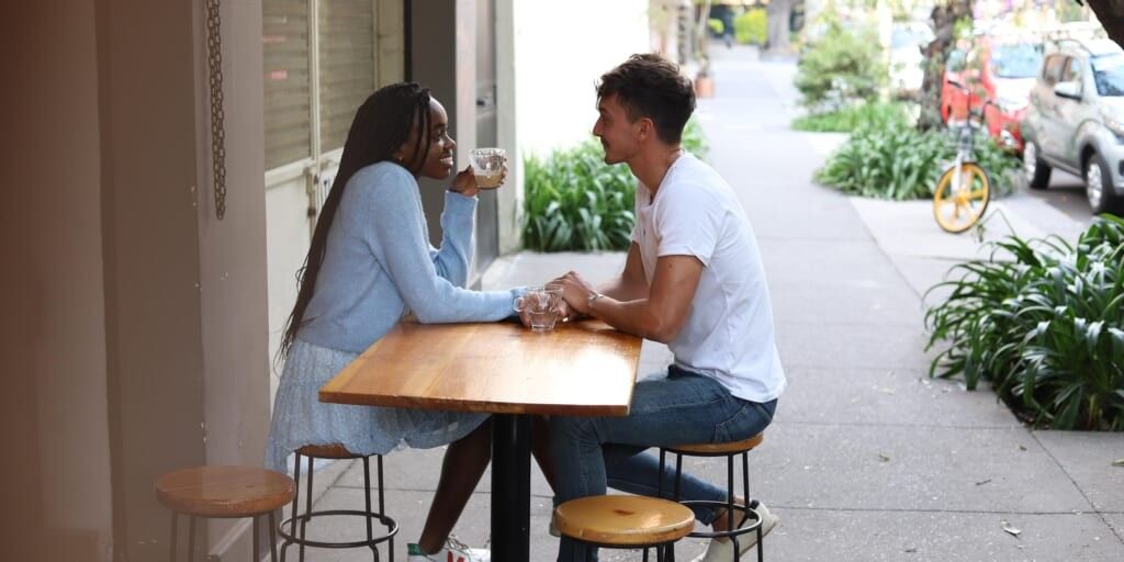 Couple having coffee together by Good Faces on Unsplash