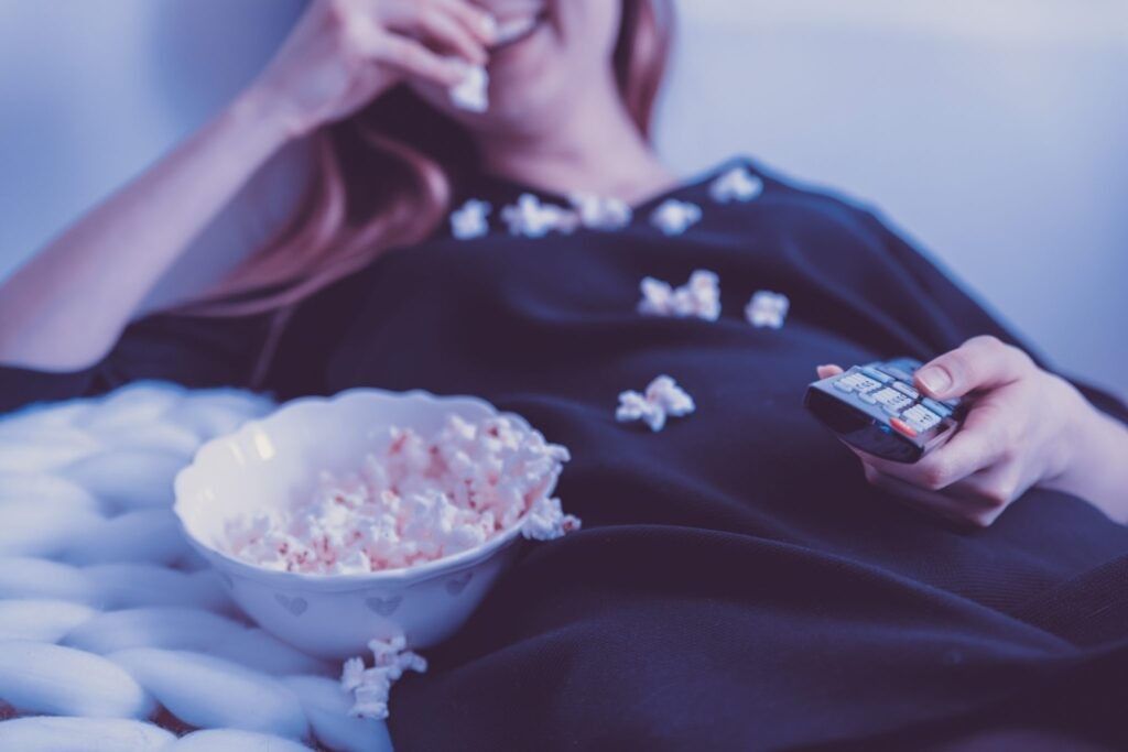 Woman-eating-popcorn