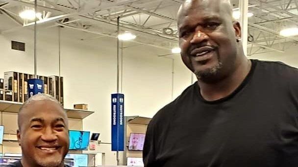 man standing with Shaquille O