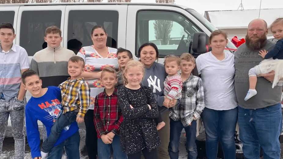 12 children and a man and a woman