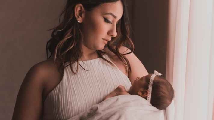 woman holding a baby