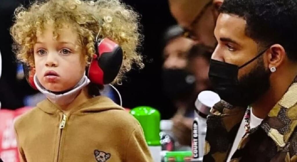 Drake and son Adonis at a basketball game