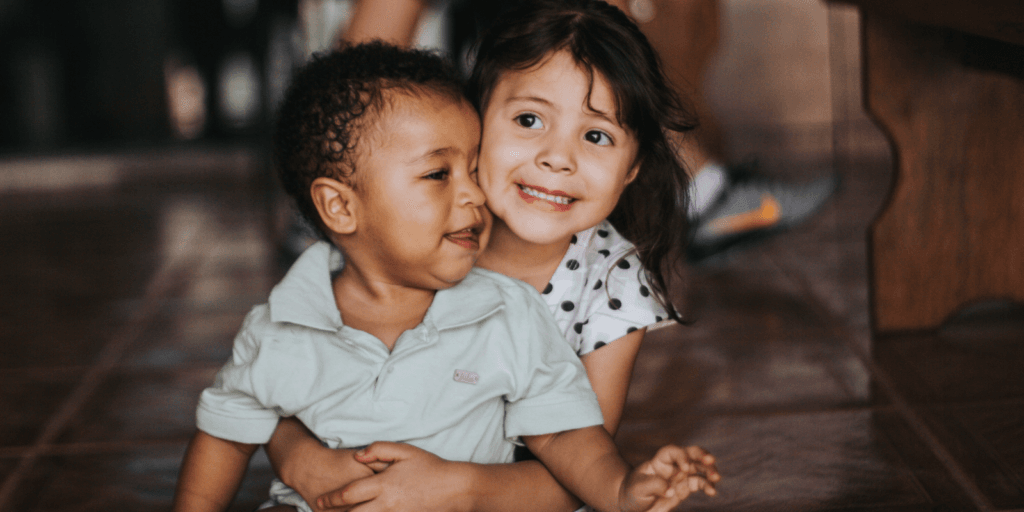 2 little kids hugging