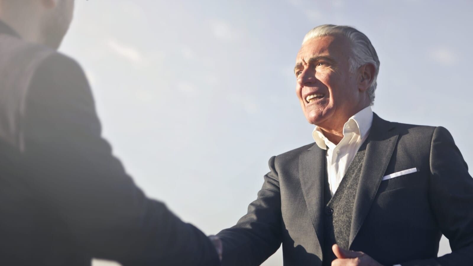 two people shaking hands