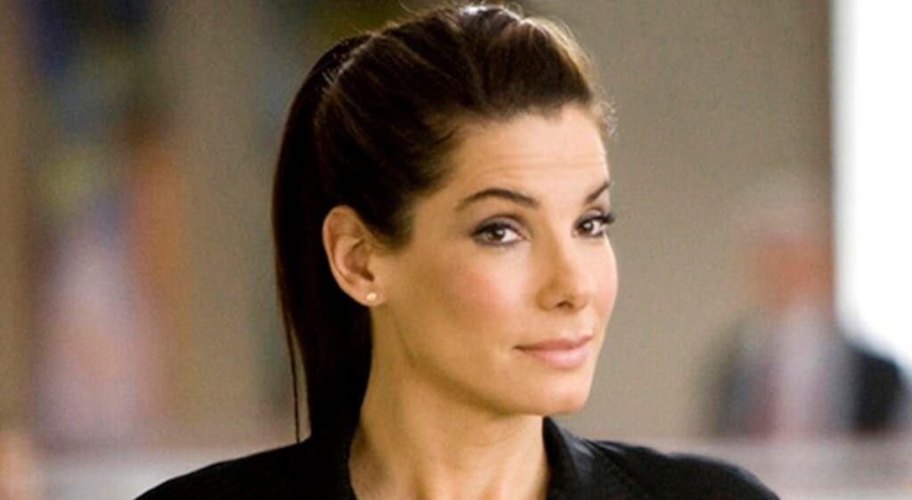Sandra Bullock raising an eyebrow at the camera