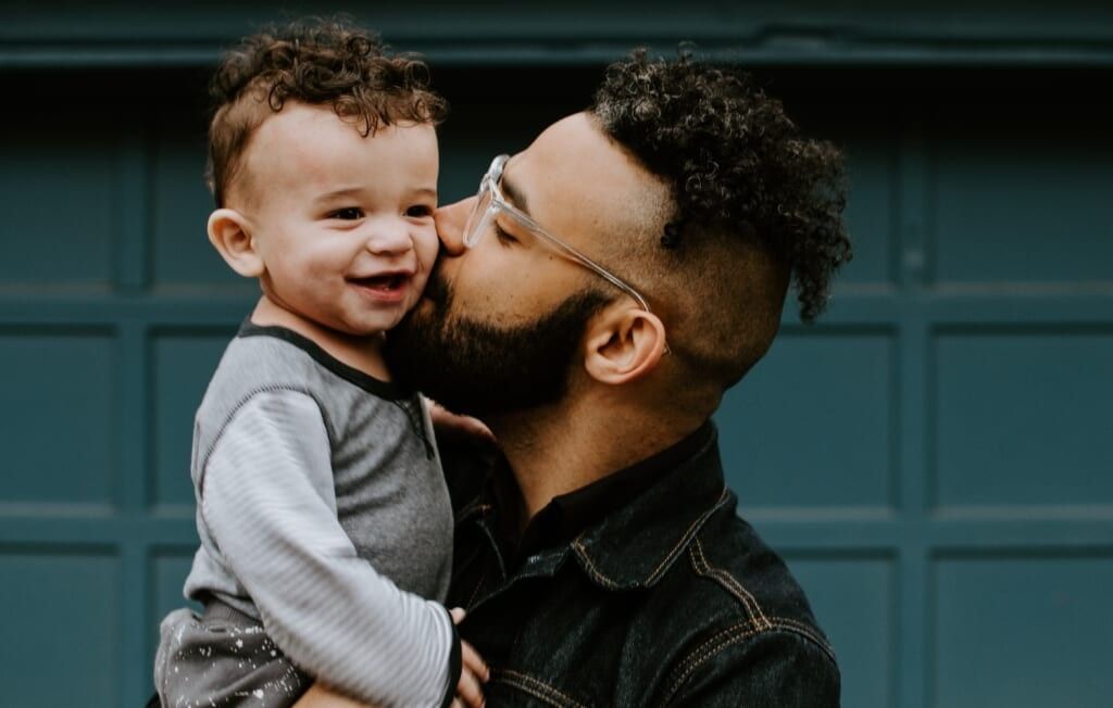 father and son in a cute moment