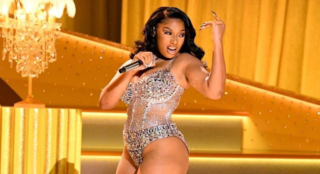 Megan Thee Stallion in jeweled bodysuit.