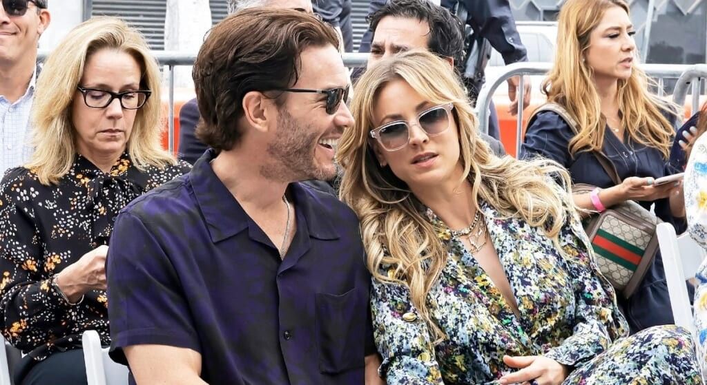 Kaley Cuoco with boyfriend tom Pelphrey talking.