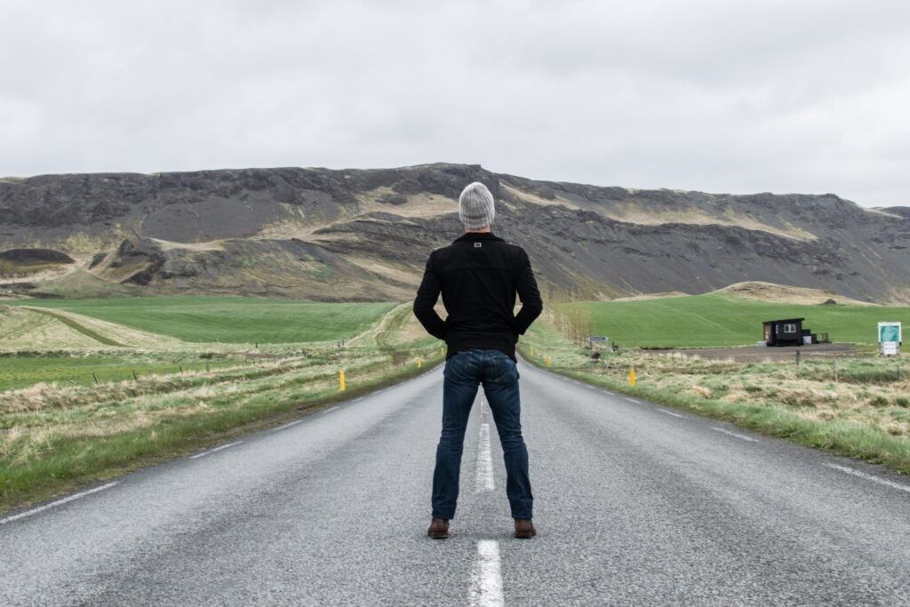 Man-standing-in-a-power-pose-on-the-street