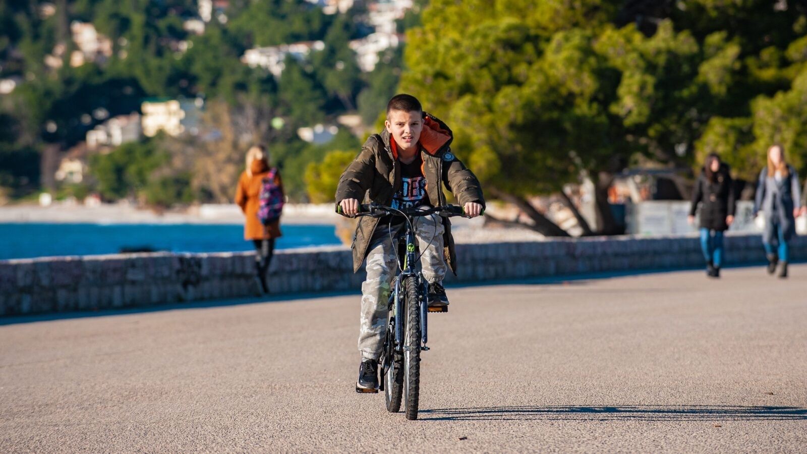 boy riding a bike