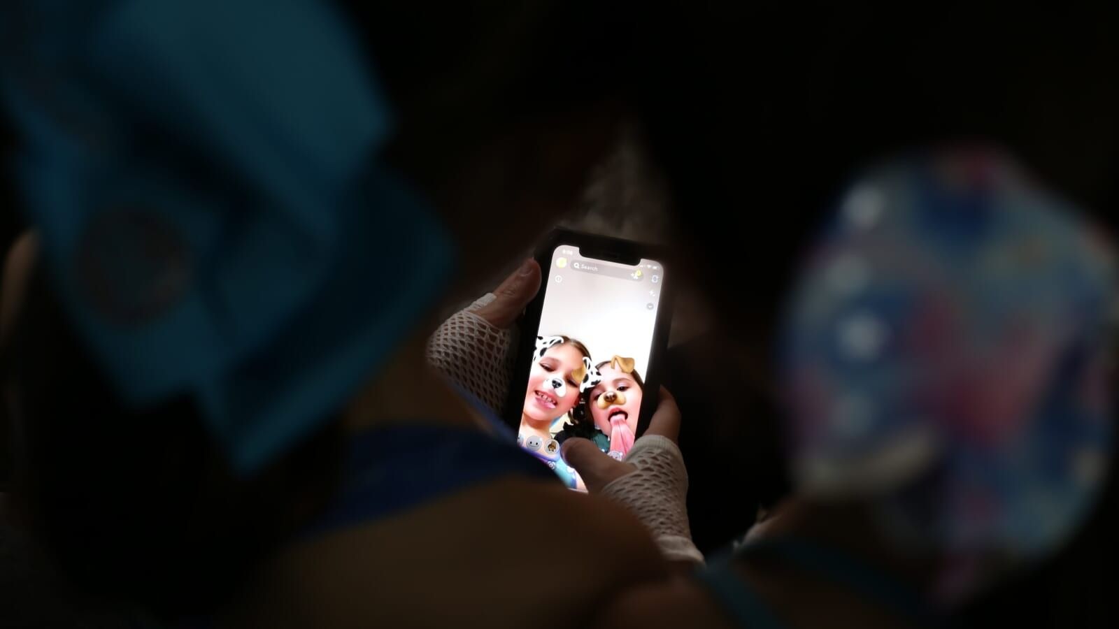 person viewing a snapchat post on a phone