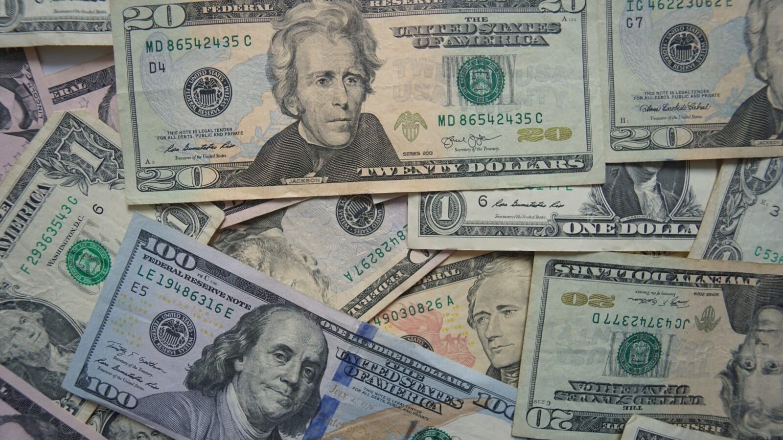 various dollar bills laid out