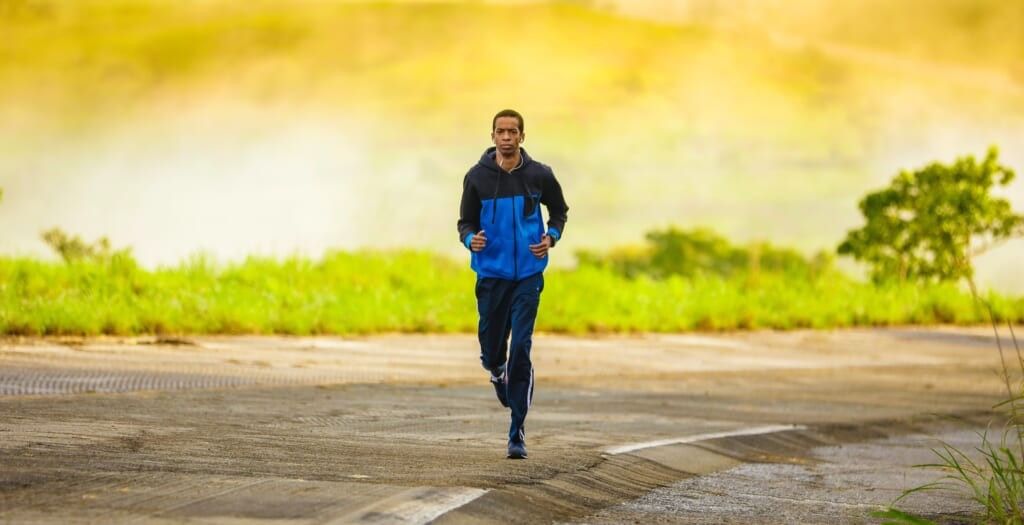 young man goes on run outside